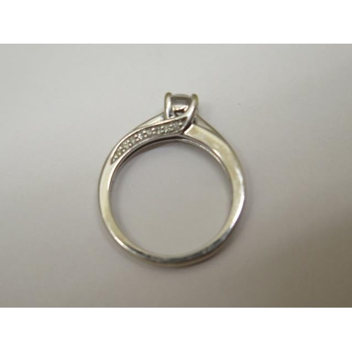 751 - An 18ct white gold diamond solitaire ring, 0.37ct, with diamond shoulders, IGI certificate, stamped ... 