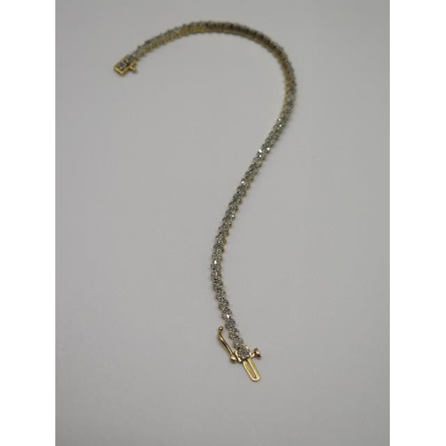 754 - A sterling gilt diamond tennis bracelet, 19cm long, in good condition