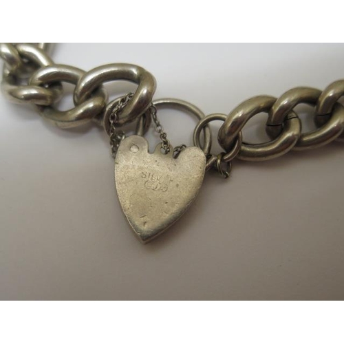 756 - A Georg Jensen sterling silver charm bracelet, marked GJLd, 27 grams, in generally good condition