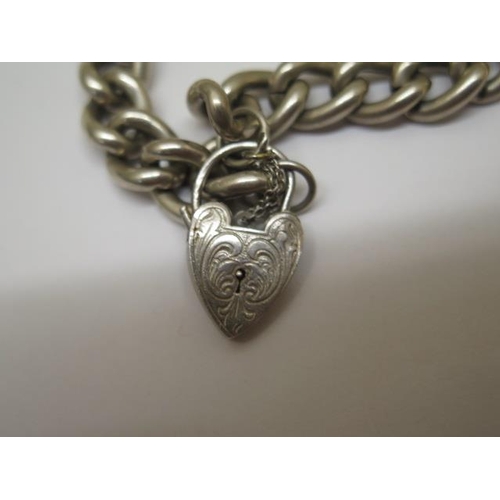 756 - A Georg Jensen sterling silver charm bracelet, marked GJLd, 27 grams, in generally good condition