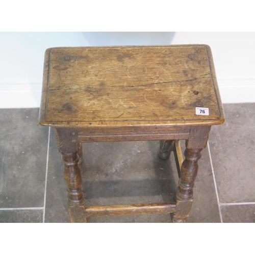 76 - An 18th century oak joint stool, 57cm tall x 45cm x 27cm, with wear consistent with age and later re... 