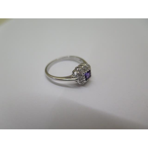 766 - A 14ct white gold amethyst and diamond ring, hallmarked, size N/O, head approx 9mm x 8mm, in good co... 