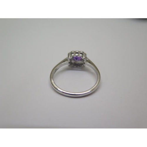 766 - A 14ct white gold amethyst and diamond ring, hallmarked, size N/O, head approx 9mm x 8mm, in good co... 