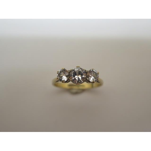 771 - A 9ct hallmarked three stone (synthetic) ring, size O, approx 2.4 grams, in good condition