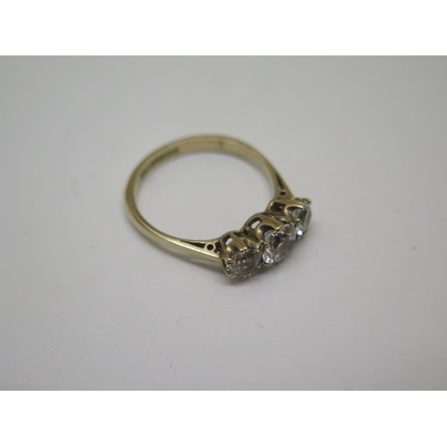 771 - A 9ct hallmarked three stone (synthetic) ring, size O, approx 2.4 grams, in good condition