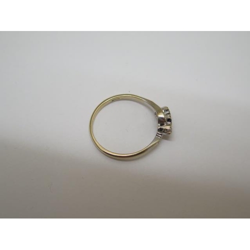 773 - A 9ct three stone (synthetic) cross over ring, size S, approx 2.1 grams, in good condition