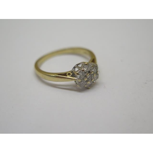 775 - A hallmarked 18ct yellow gold seven stone diamond cluster ring, 0.50ct in total, ring size N, approx... 