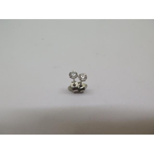 779 - A pair of 14ct white gold diamond stud earrings, approx 0.16ct each, white gold backs, in good condi... 