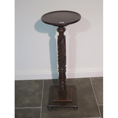 78 - A mahogany carved jardinere / plant stand in good condition, 95cm tall x 31cm diameter top