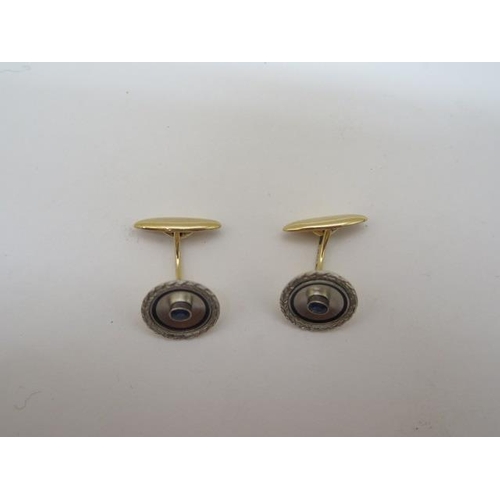 783 - A pair of Russian gold and platinum sapphire cufflinks, marked 56 for 14ct, maker IM, total weight a... 