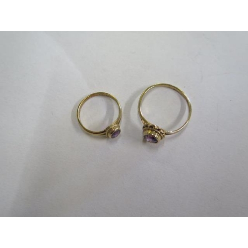 785 - Two hallmarked 9ct gold amethyst rings, size P and G, and a pair of 9ct gold amethyst earrings, mark... 