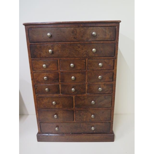 79 - A walnut veneered sixteen drawer jewellery / trinket collectors chest, 47cm tall x 32cm x 20cm