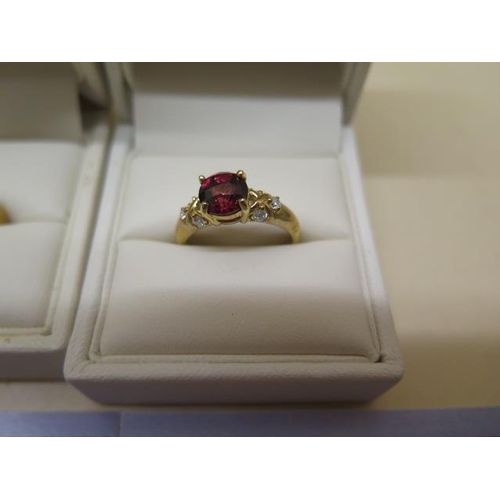 793 - Two GTV 9ct yellow gold rings, Apatite and diamond Rhodite garnet and diamond. both size N, total we... 