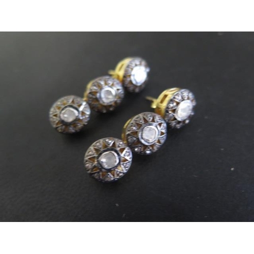 804 - A pair of gilt three stone rough cut diamond earrings, 3.5cm long, in good condition