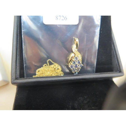 819 - Three GTV 9ct yellow gold pendants two with fine chains and a 9ct white gold pendant - 2 with certif... 