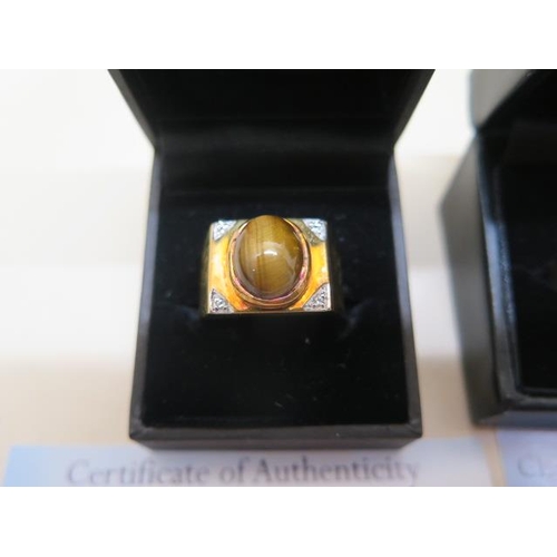 823 - A GTV 9ct yellow gold moostone gents ring, size T, and a 9ct Tigers eye and white topaz gents ring, ... 