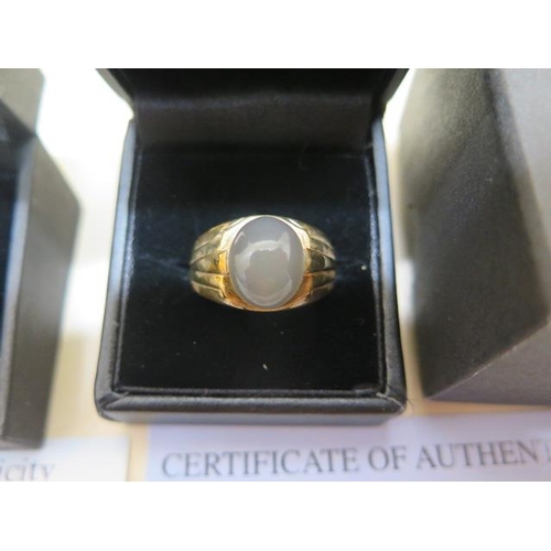 823 - A GTV 9ct yellow gold moostone gents ring, size T, and a 9ct Tigers eye and white topaz gents ring, ... 