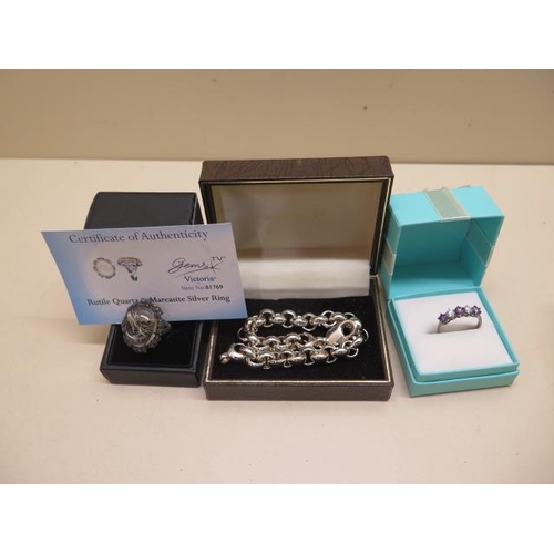 826 - Two GTV silver rings and a silver 22cm bracelet, 1.6 troy oz, all good condition with one certificat... 