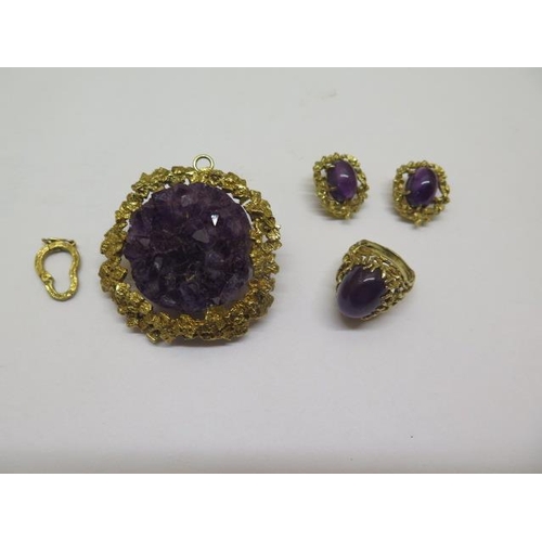 828 - A hallmarked 9ct yellow gold cabouchon amethyst Harris and Maisey ring and earring set, with a simil... 