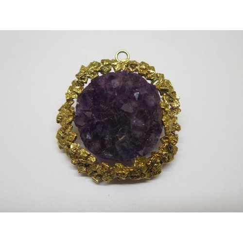 828 - A hallmarked 9ct yellow gold cabouchon amethyst Harris and Maisey ring and earring set, with a simil... 