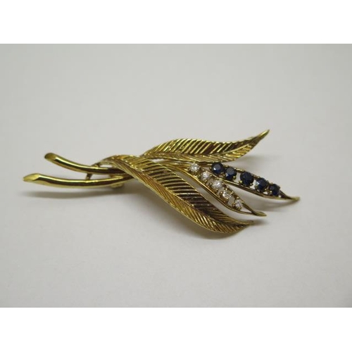 829 - A Harris and Maisey 18ct yellow gold hallmarked diamond and sapphire and sapphire leaf brooch, 6.5cm... 