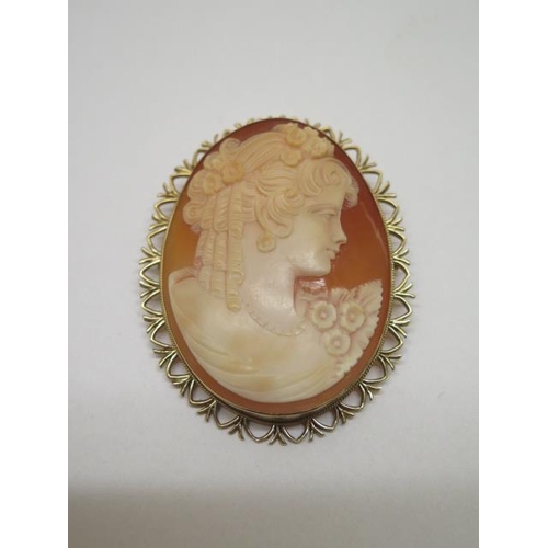 830 - A 9ct yellow gold cameo, 6cm x 4.7cm, generally good, approx 17.2 grams, and an 18ct hallmarked gold... 