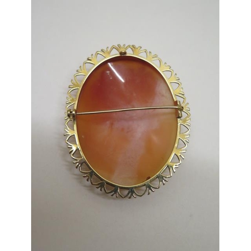 830 - A 9ct yellow gold cameo, 6cm x 4.7cm, generally good, approx 17.2 grams, and an 18ct hallmarked gold... 