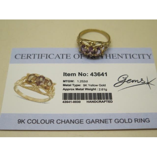 834 - Two GTV 9ct yellow gold rings, one with 3 colour change garnets with certificate, size N, the other ... 