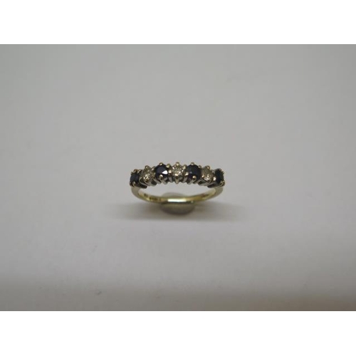 839 - A hallmarked 9ct yellow gold diamond and sapphire seven stone ring, size O, approx 2.7 grams, genera... 