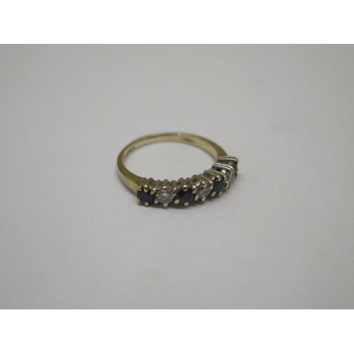 839 - A hallmarked 9ct yellow gold diamond and sapphire seven stone ring, size O, approx 2.7 grams, genera... 