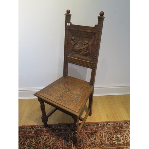 85 - A Victorian carved oak hall chair, 108cm tall x 46cm wide