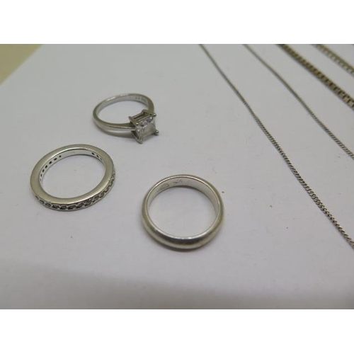 855 - Three silver rings, size K, and five silver necklaces, total weight approx 1.25 troy oz