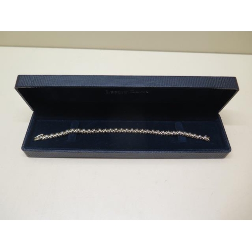 857 - A 9ct yellow gold diamond bracelet, approx total 1ct diamonds, 19cm long, approx 13.5 grams