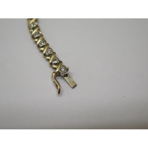 857 - A 9ct yellow gold diamond bracelet, approx total 1ct diamonds, 19cm long, approx 13.5 grams