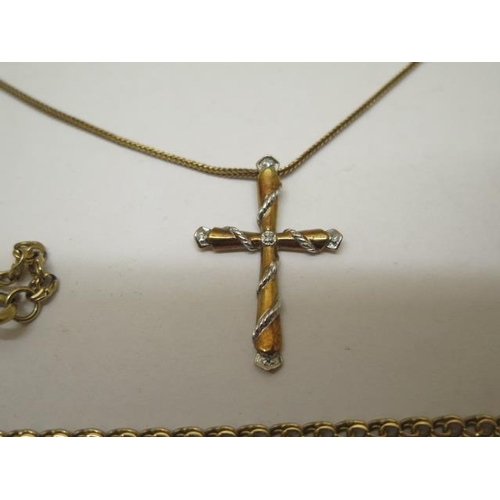 860 - A Brooks and Bently Peace and Purity 9ct yellow gold diamond cross on chain, and a 9ct 52cm chain, t... 