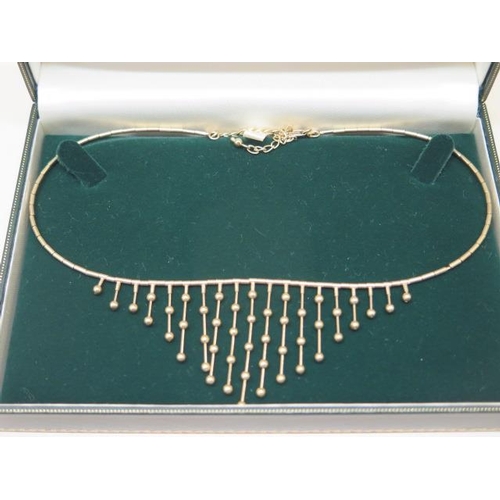 861 - A hallmarked 9ct yellow gold necklet, approx 42cm long, approx 11 grams, in good condition