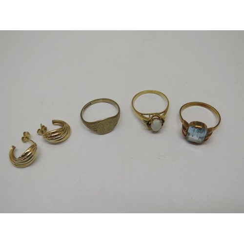 865 - Three 9ct yellow gold rings, sizes N/O/Q, and a pair of 9ct earrings, total weight approx 9.2 grams