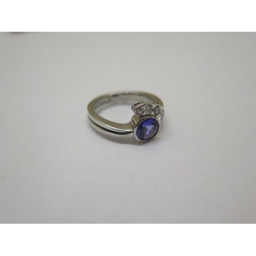 867 - A good quality platinum diamond and tanzanite ring, size O, approx 11 grams, diamonds approx 0.45ct,... 