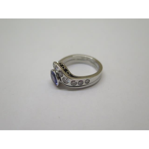 867 - A good quality platinum diamond and tanzanite ring, size O, approx 11 grams, diamonds approx 0.45ct,... 