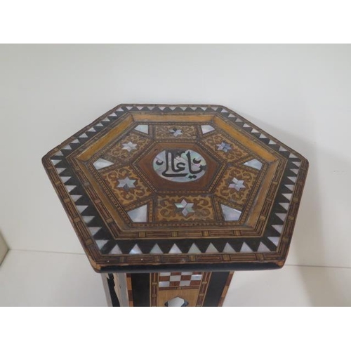 90 - A Damascus mother of pearl inlaid side table, 47cm tall x 30cm wide, in generally good condition, sm... 