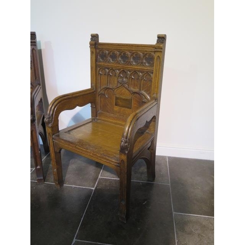 91 - A near pair of Gothic type open throne chairs, 114cm tall x 67cm x 52cm deep, both in good sturdy co... 