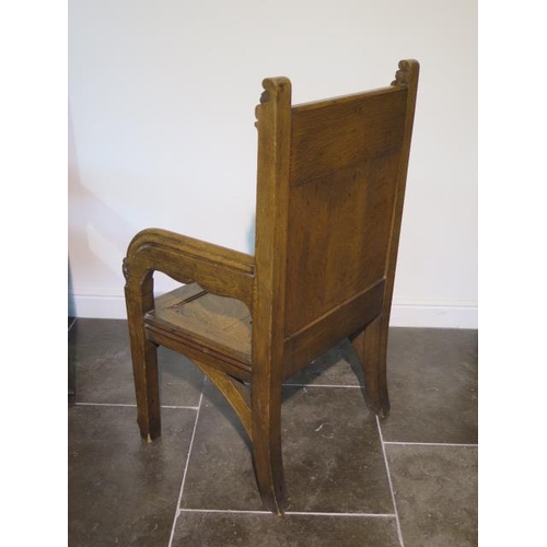 91 - A near pair of Gothic type open throne chairs, 114cm tall x 67cm x 52cm deep, both in good sturdy co... 