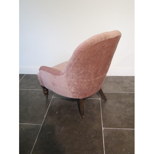 93 - A Victorian button back fireside chair, recently reupholstered, 87cm tall x 74cm wide x 75cm deep