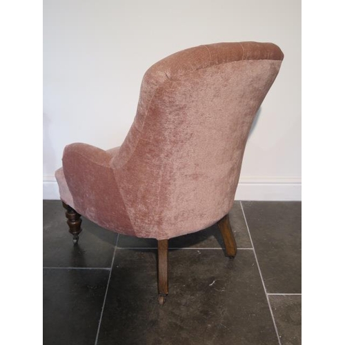 94 - A Victorian button back fireside chair recently reupholstered, 92cm tall x 65cm wide x 76cm deep