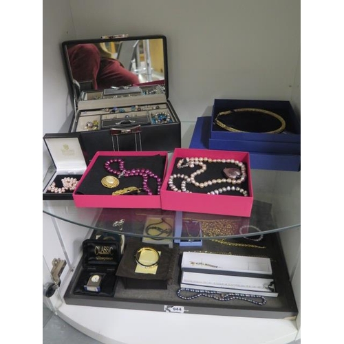 944 - A good assortment of costume and other jewellery including Swarovski, Michael Kors, Buckley