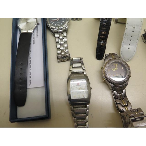 970 - A quantity of gents quartz watches including Diesel, Jeep etc, some running and some may need batter... 