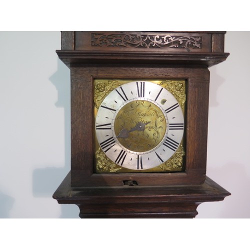 217 - An oak carved 30 hour single hand longcase clock, the dial signed Wm Russell Wootton, with a 8