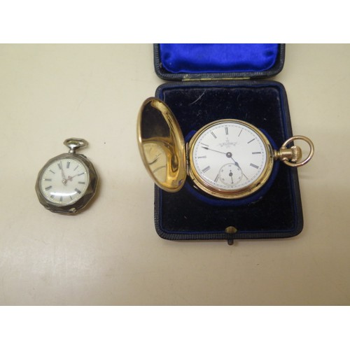 959 - A gold filled or gold plated Elgin full hunter pocket watch with white enamel face and subsidiary se... 