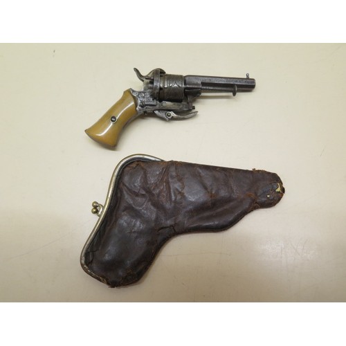 1087 - An ealry 1800s 0.54 pin fire revolver purse pistol, 13cm long, with leather purse, cocks and fires, ... 