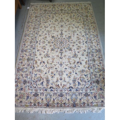 181 - A hand knotted woollen Kashan rug, 2.12m x 1.45m, in generally good condition